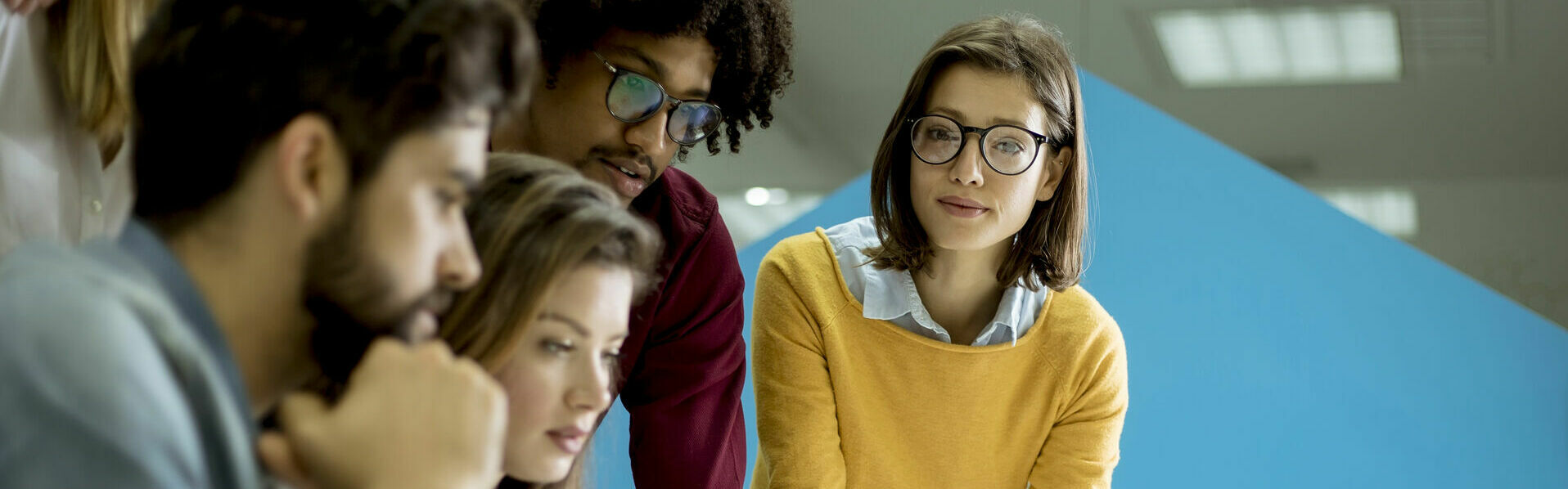 Group of young multiethnic business people working and communica Group of young multiethnic business people working and communica